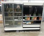 Lot: 13-7-3741: 8' Long Case - MFG Unknown, unit was used as a display and has demo TV inside. Working condition unknown.