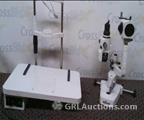 Lot: 15-7-1588: (1) Topcon CS-IV (1) Topcon 1800 E-Chair (1) Reichert Xcel 200 12560 