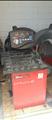 Lot: 15-3-5719: (1) John Bean VPI System III Wheel Balancer (1) John Bean VPI System III Wheel Balancer (1) John Bean VPI System II Wheel Balancer 