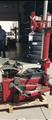 Lot: 15-3-5896: (1) Coats 7060AX Rim clamp tire changer (1) Coats 5060AX Rim clamp tire changer 