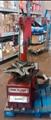 Lot: 15-3-4887: (1) Coats 7060AX Rim clamp tire changer (1) Coats 5060AX Rim clamp tire changer 