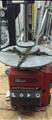 Lot: 15-3-6448: (1) John Bean EHP SYSTEM IV - Tire changer (1) John Bean EHP SYSTEM IV - Tire changer (1) John Bean EHP SYSTEM IV - Tire changer 