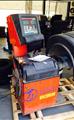 Lot: 15-3-6904: (1) Coats 1250 Wheel Balancer (1) Corghi EM 8040 Computerized Wheel Balancer 