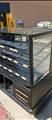 Lot: 15-3-7219: (1) True GDM-12  (1) Hardt Zone Hot Deli Case (1) Belshaw TG-50 (1) LVO FL14E Pan Washer (1) Hobart HR7E Electric Rotary Oven (2) Bakery Display Case - Pastry 