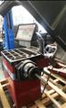 Lot: 15-3-7437: (1) Coats 5060AX Rim clamp tire changer (1) Coats 950 Electric Wheel Balancer 