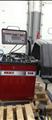 Lot: 15-3-7485: (1) Coats 950 Electric Wheel Balancer (1) Coats 5060AX Rim clamp tire changer 