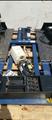 Lot: 15-3-7711: (1) Challenger CL 10 - 2 post automotive lift (1) Challenger 67000 Low Rise Auto Lift 