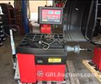 Lot: 15-3-8798: (1) Corghi A9820 TI Rim Clamp Tire Changer (1) Corghi EM 8540 Computerized wheel balancer 