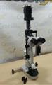 Lot: 15-7-9669: (1) Woodlyn Opthamlic Chair (1) Woodlyn Optical Stand (1) Woodlyn Slit Lamp 