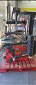 Lot: 15-3-10661: (1) John Bean EHP System II - Tire changer (1) Coats 5060AX Rim clamp tire changer 
