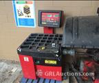 Lot: 15-3-11385: (1) Corghi A9824 TI Rim Clamp Tire Changer (1) Corghi EM 8540 Computerized wheel balancer 