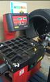 Lot: 15-3-11385: (1) Corghi A9824 TI Rim Clamp Tire Changer (1) Corghi EM 8540 Computerized wheel balancer 